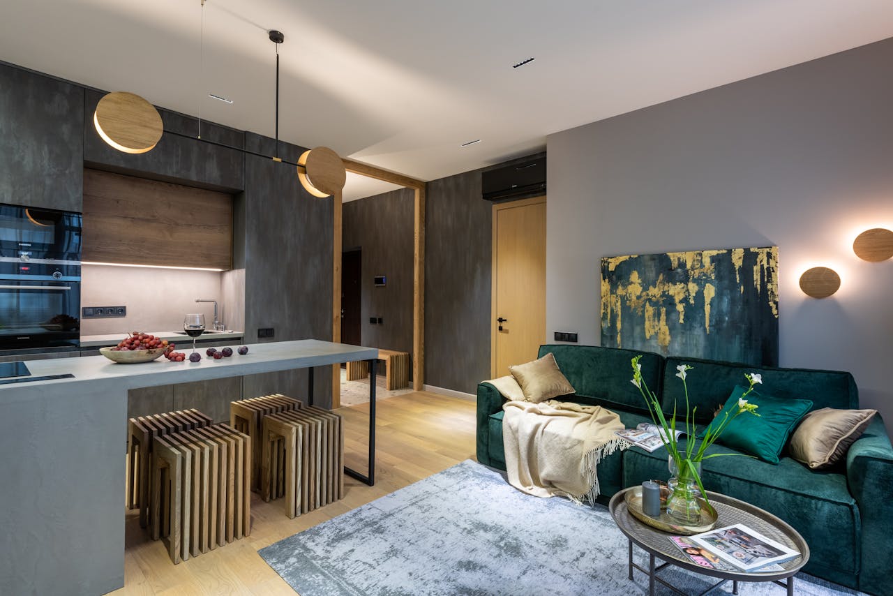 Luxurious open concept living room and kitchen interior with modern decor and cozy ambiance.